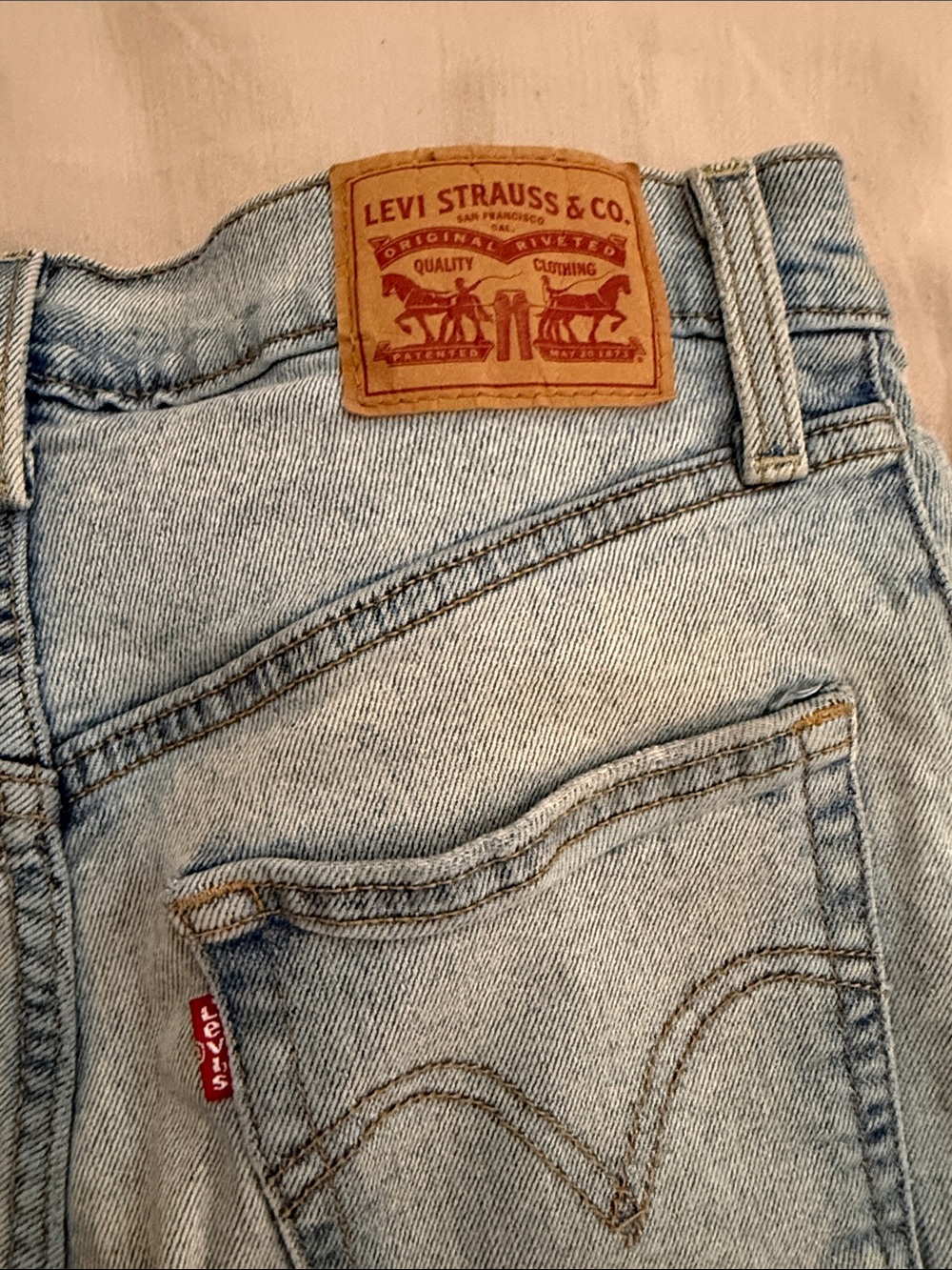 Levi's Light Blue Distressed High-Rise “Ribcage Straight” Jeans